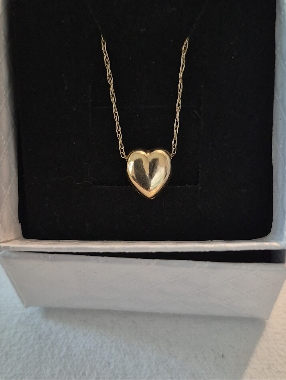 Vintage 14K gold floating puffy heart on a 14k gold chain